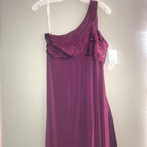 Brand new sangria floor length one shoulder gown.